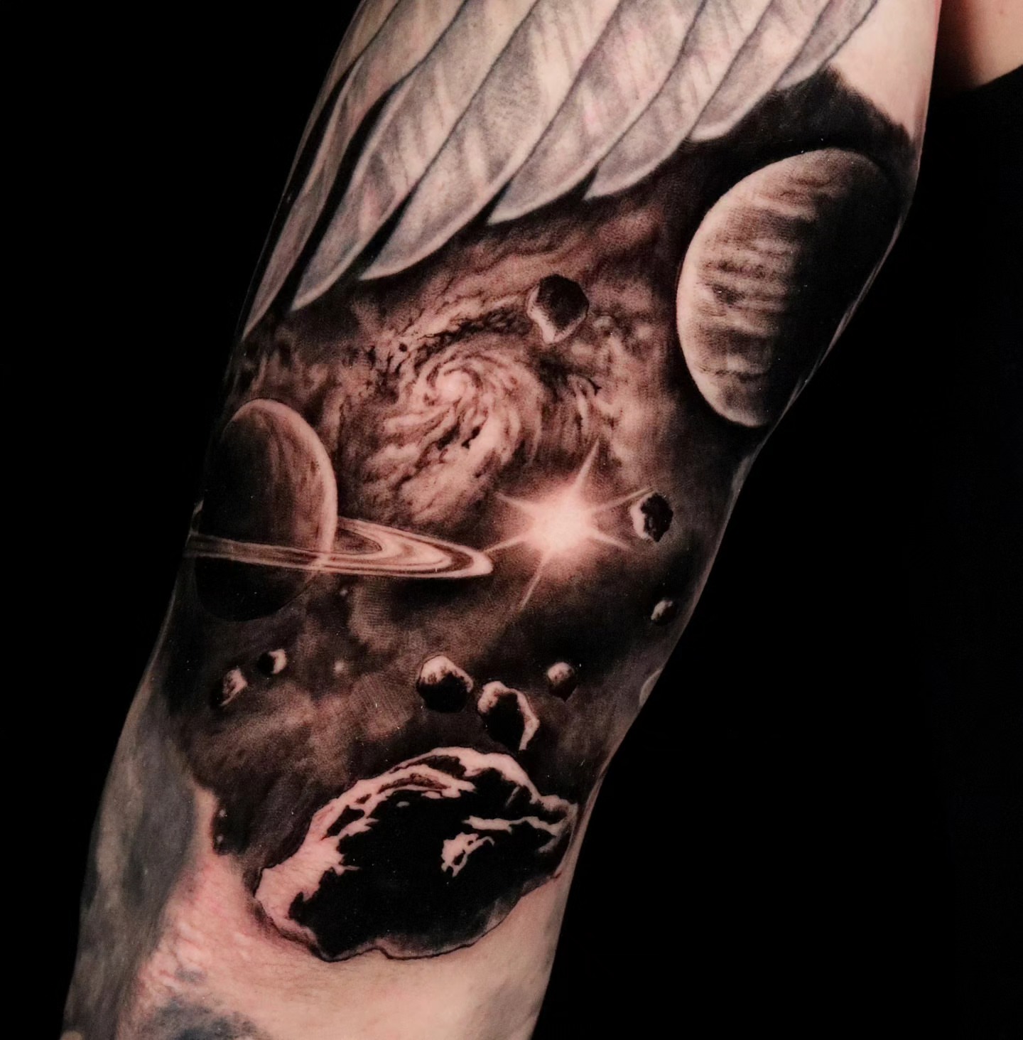 Space scene realism tattoo on the forearm by Brandon Rabago, Fort Worth, Texas