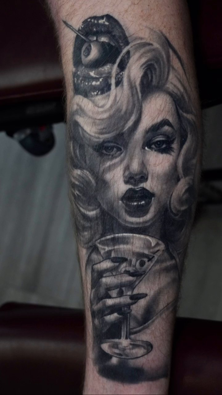 Marilyn Monroe with cocktail realism tattoo by Raul Ugarte, Roseville, California