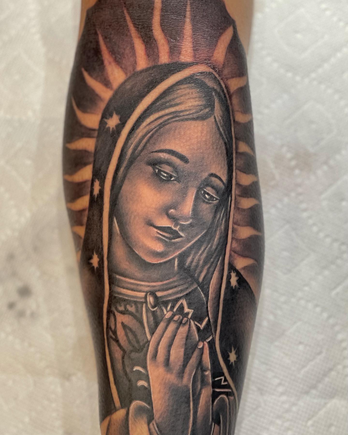 Religious figure black and grey tattoo on the forearm by LOS