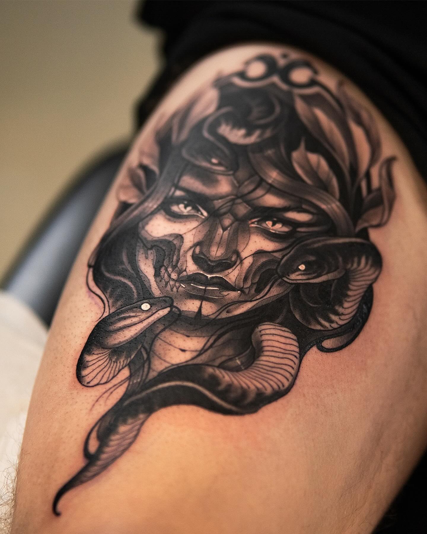 Woman with snake realism tattoo on the shoulder by Anthony Michaels, Tucson, Arizona