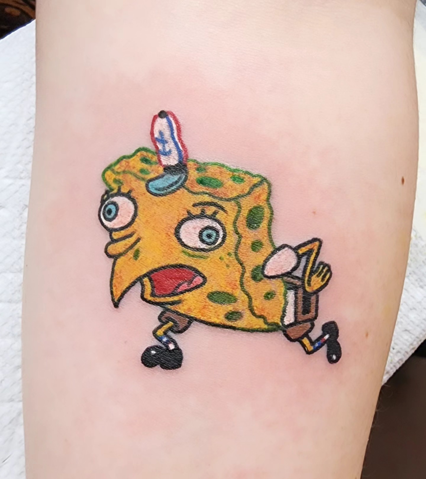 Spongebob squarepants new school tattoo on the forearm by @thedevilspaintbrush_