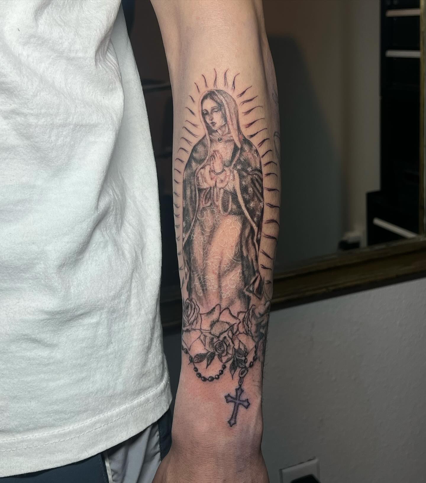 Virgin mary black and grey tattoo on the forearm by josselyn ☪︎