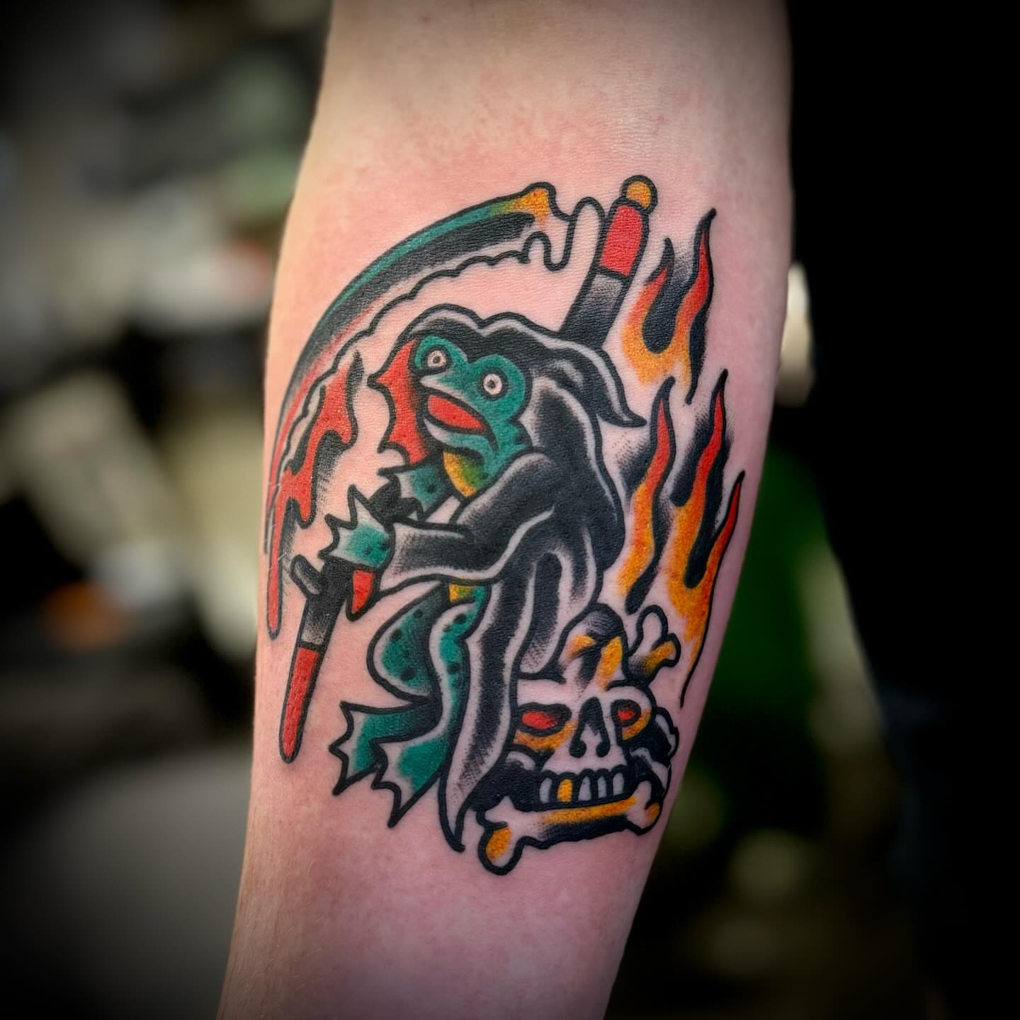 Jester skull American traditional tattoo on the forearm by Troy Mort, Altoona, Pennsylvania