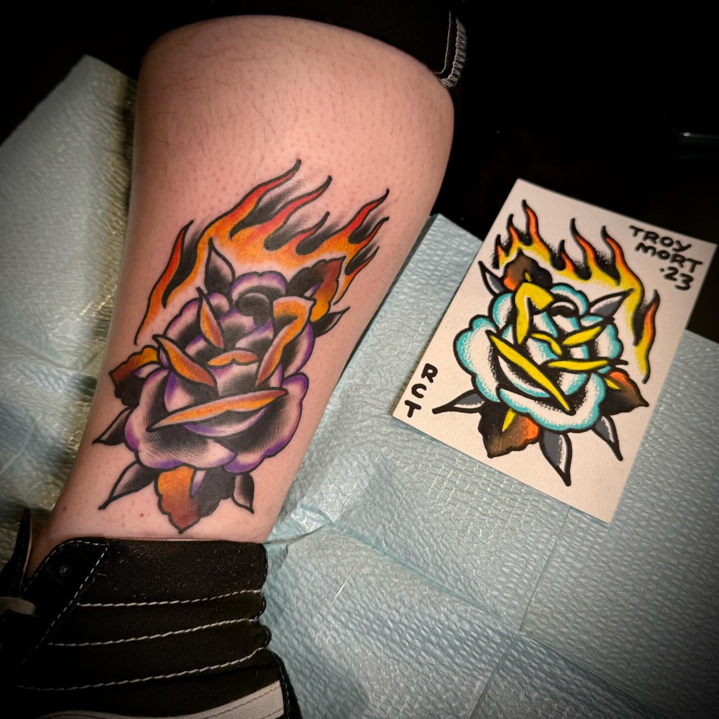 Flaming rose American traditional tattoo on the forearm by Troy Mort, Altoona, Pennsylvania