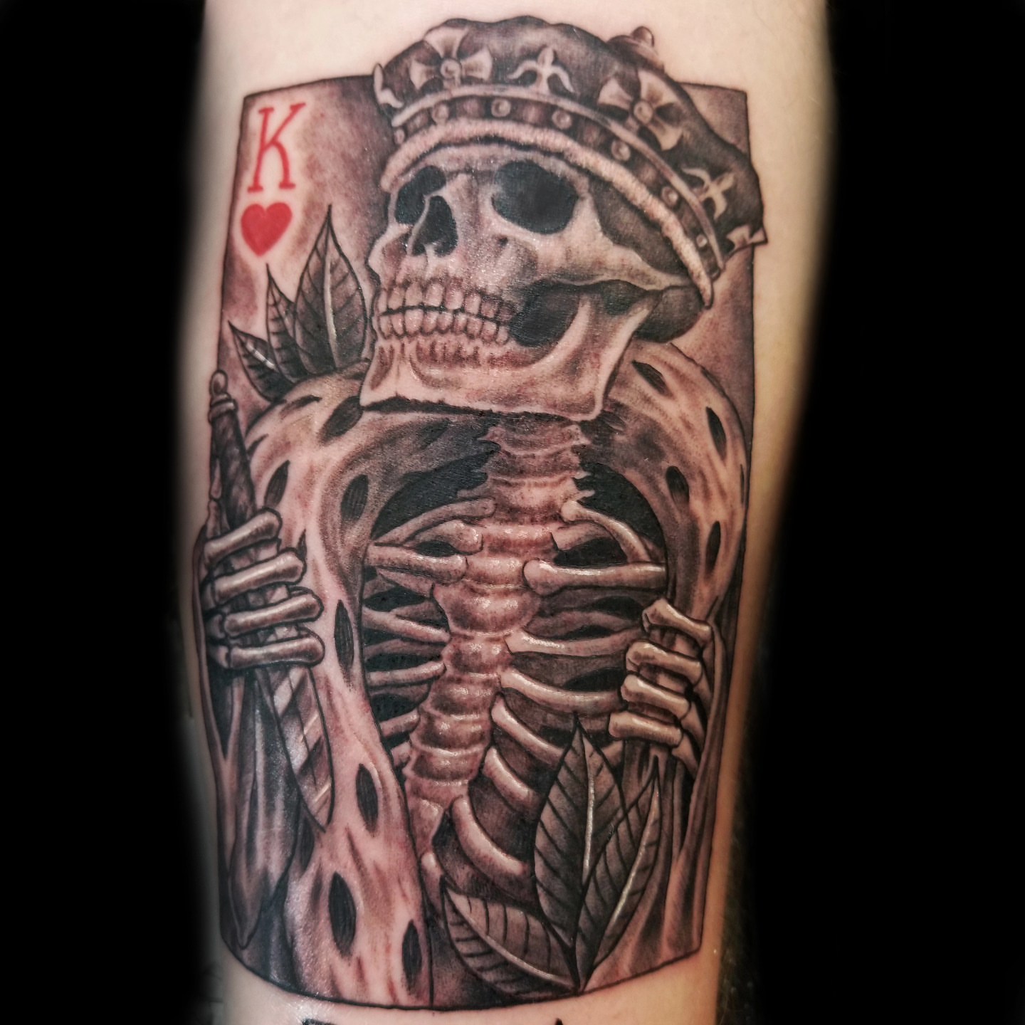 King of hearts skeleton realism tattoo on the forearm by Martin Colonna
