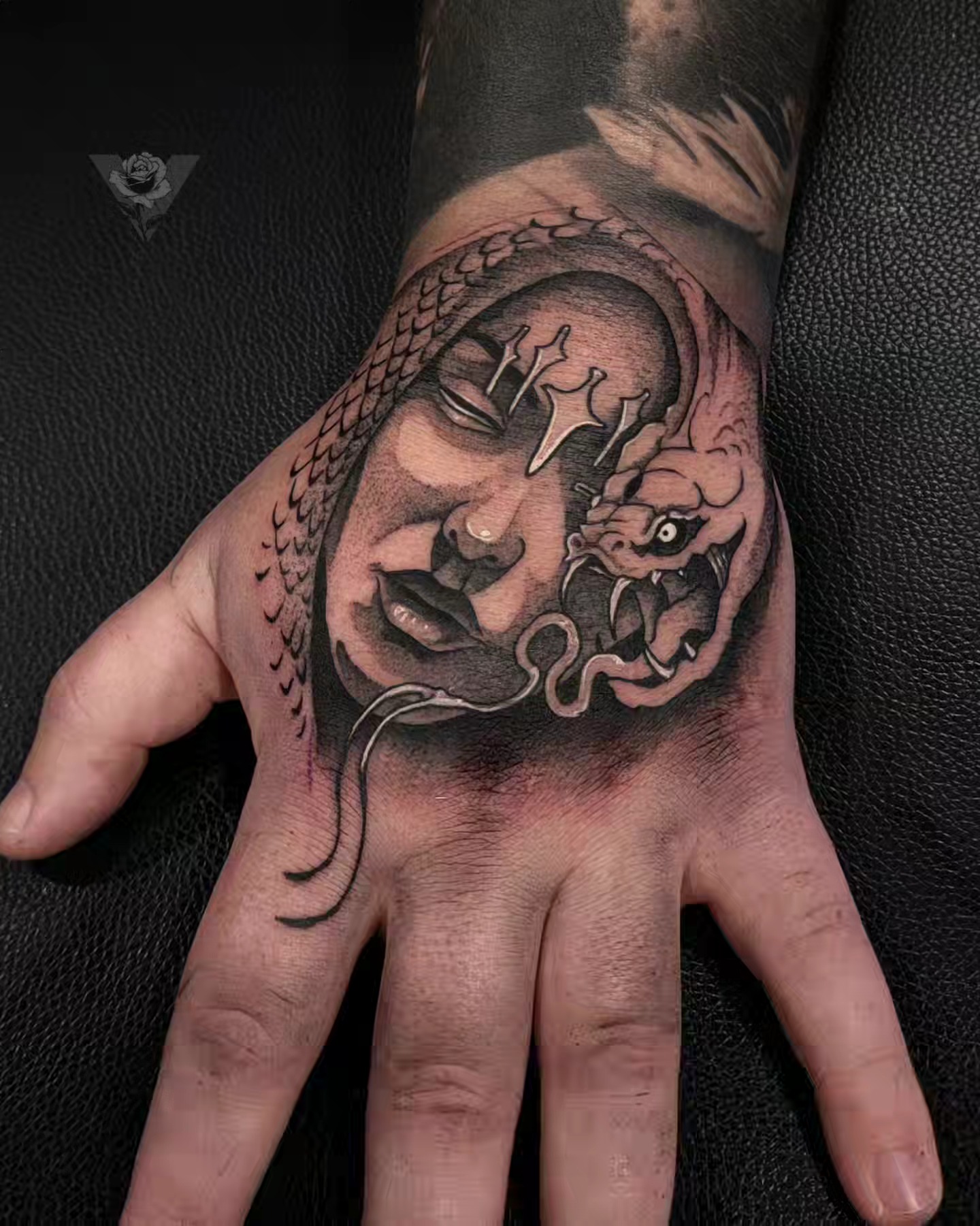 Buddha head with dragon realism tattoo on the hand by V πΊπ¦