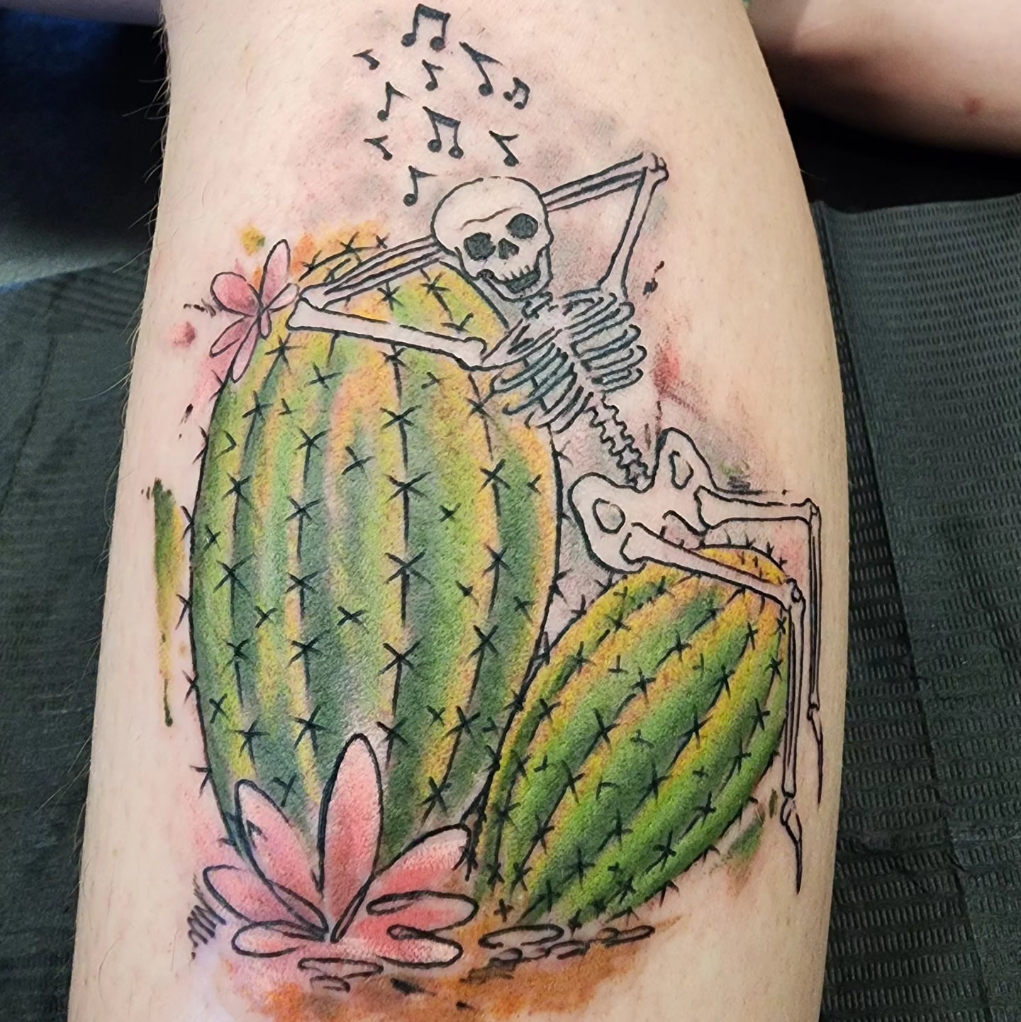 Skeleton dancing with cactus dotwork tattoo on the forearm by Martin Colonna