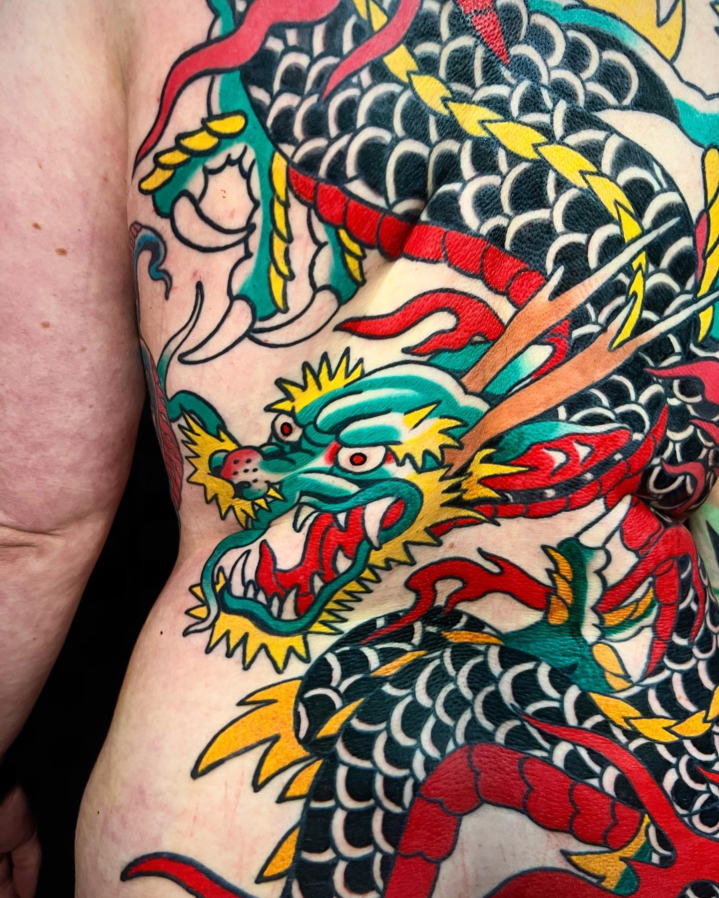 Dragon American traditional tattoo on the thigh by Nicholas Mella, Nashville, Tennessee