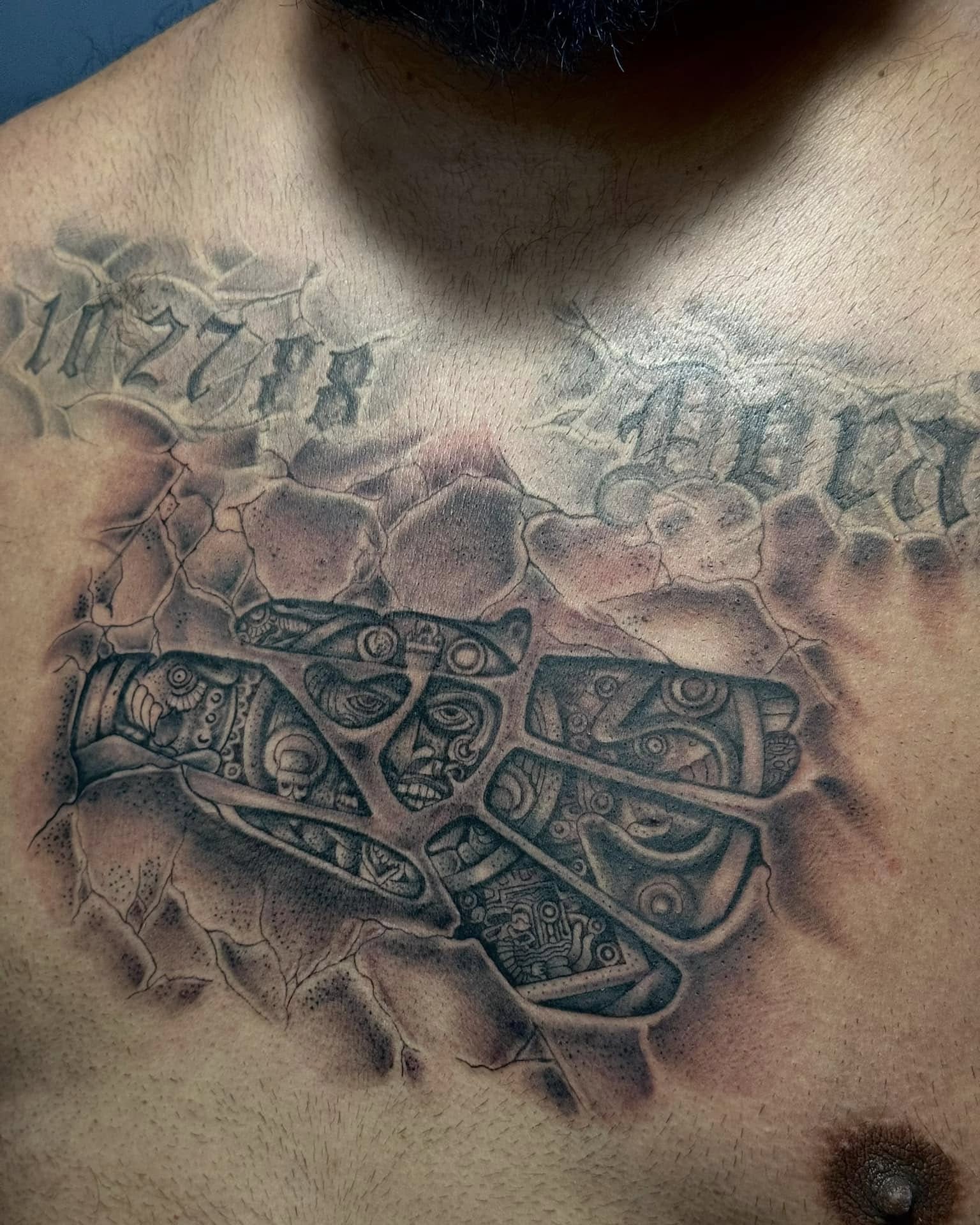 Ancient artifact geometric tattoo on the chest by Chris_Tatt2_D’Ascenzo
