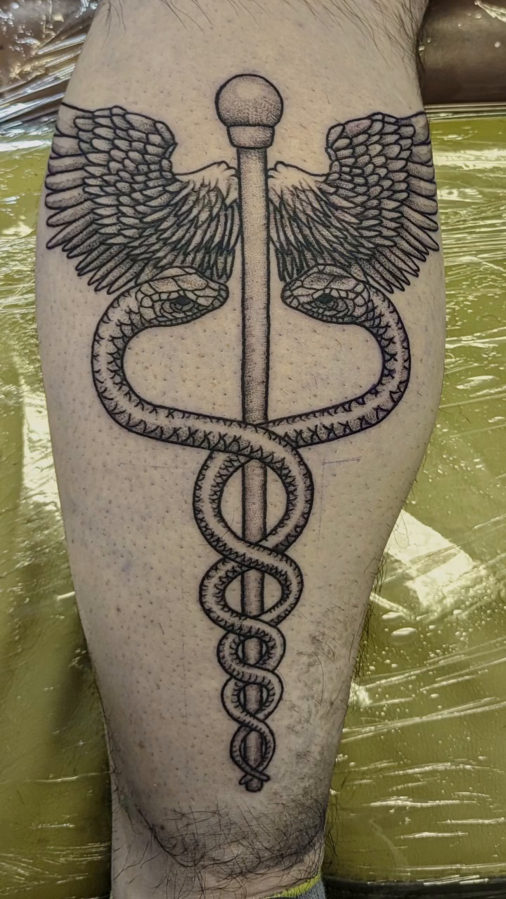 Caduceus symbol realism tattoo by William Worley