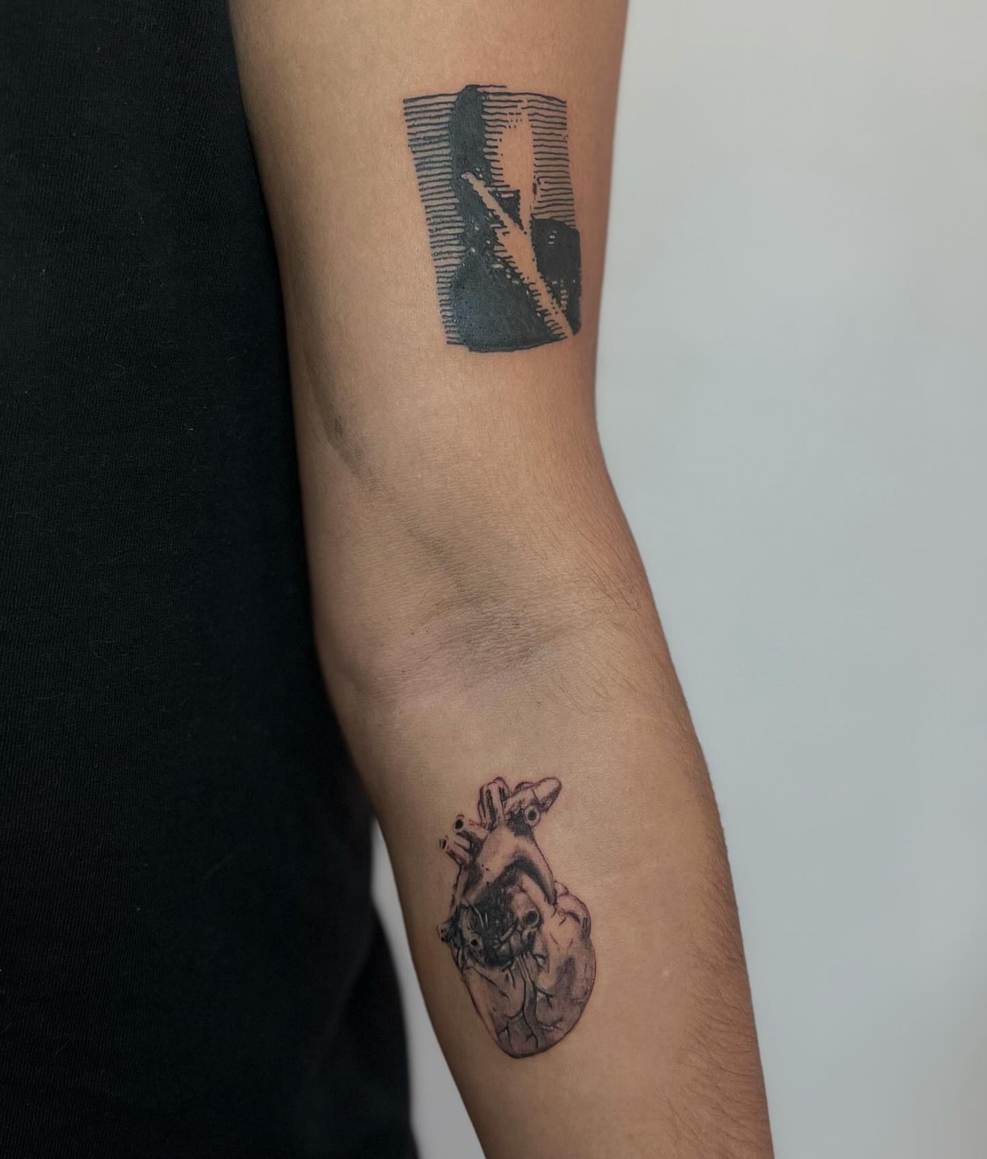Anatomical heart black and grey tattoo on the forearm by josselyn ☪︎