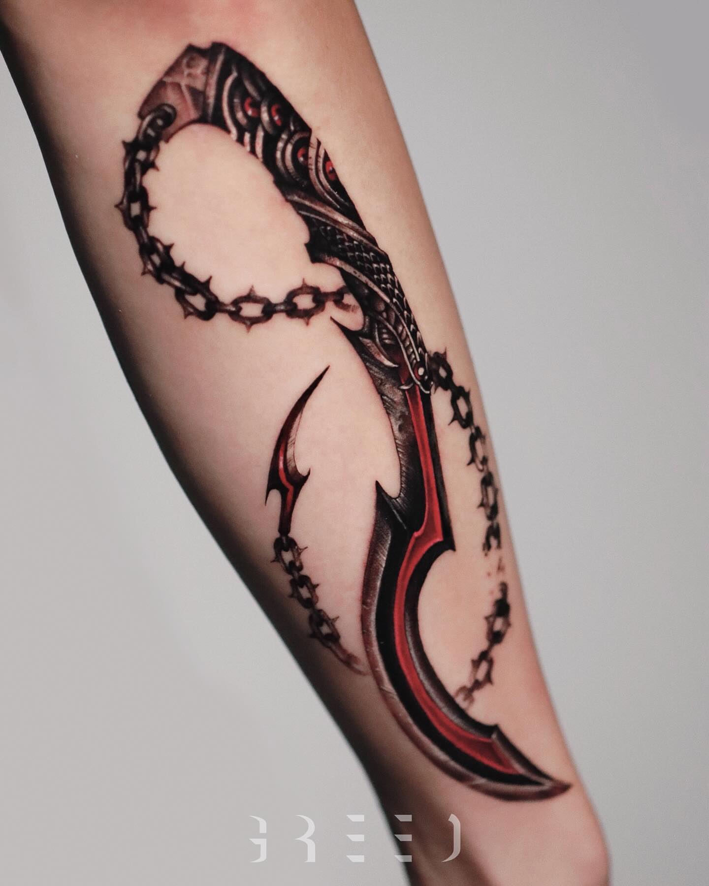 Snake and chain geometric tattoo on the forearm by 𝐆𝐑𝐄𝐄𝐃
