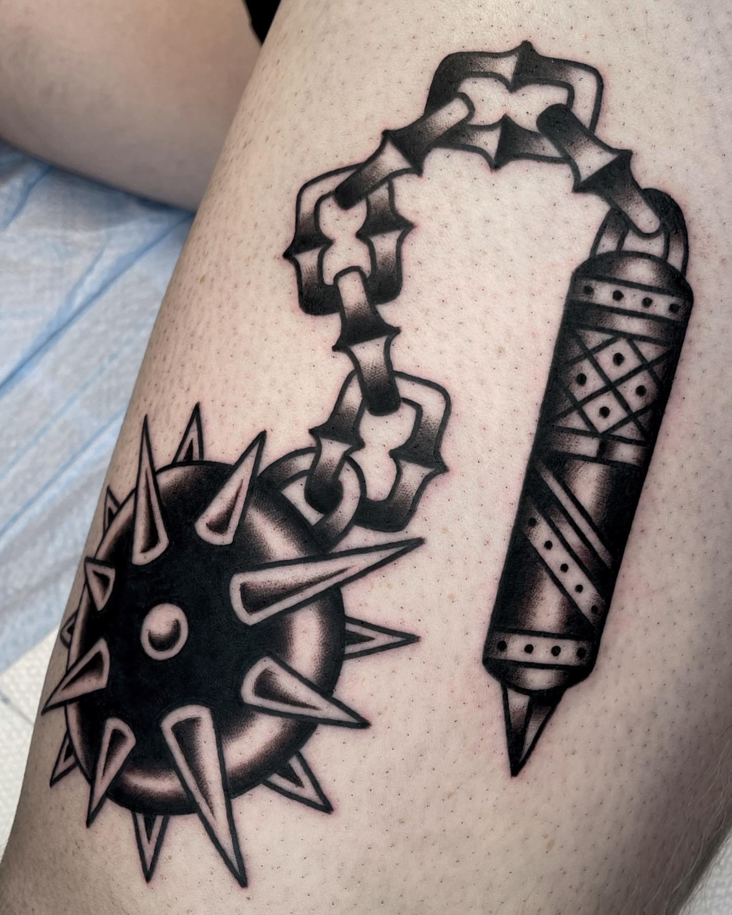 Spiked ball and chain American traditional tattoo on the thigh by Jenn ★ Reid