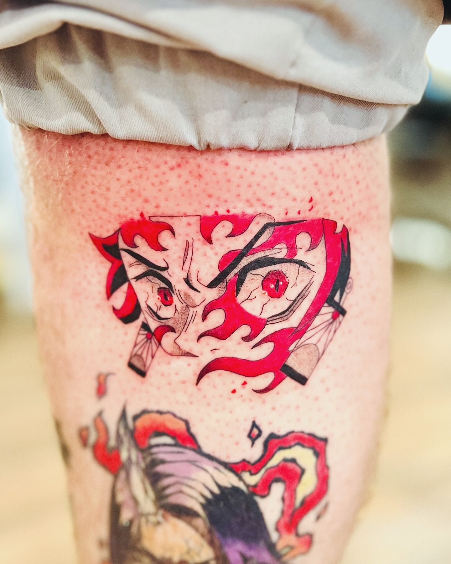 Mask dotwork tattoo on the leg by Leo