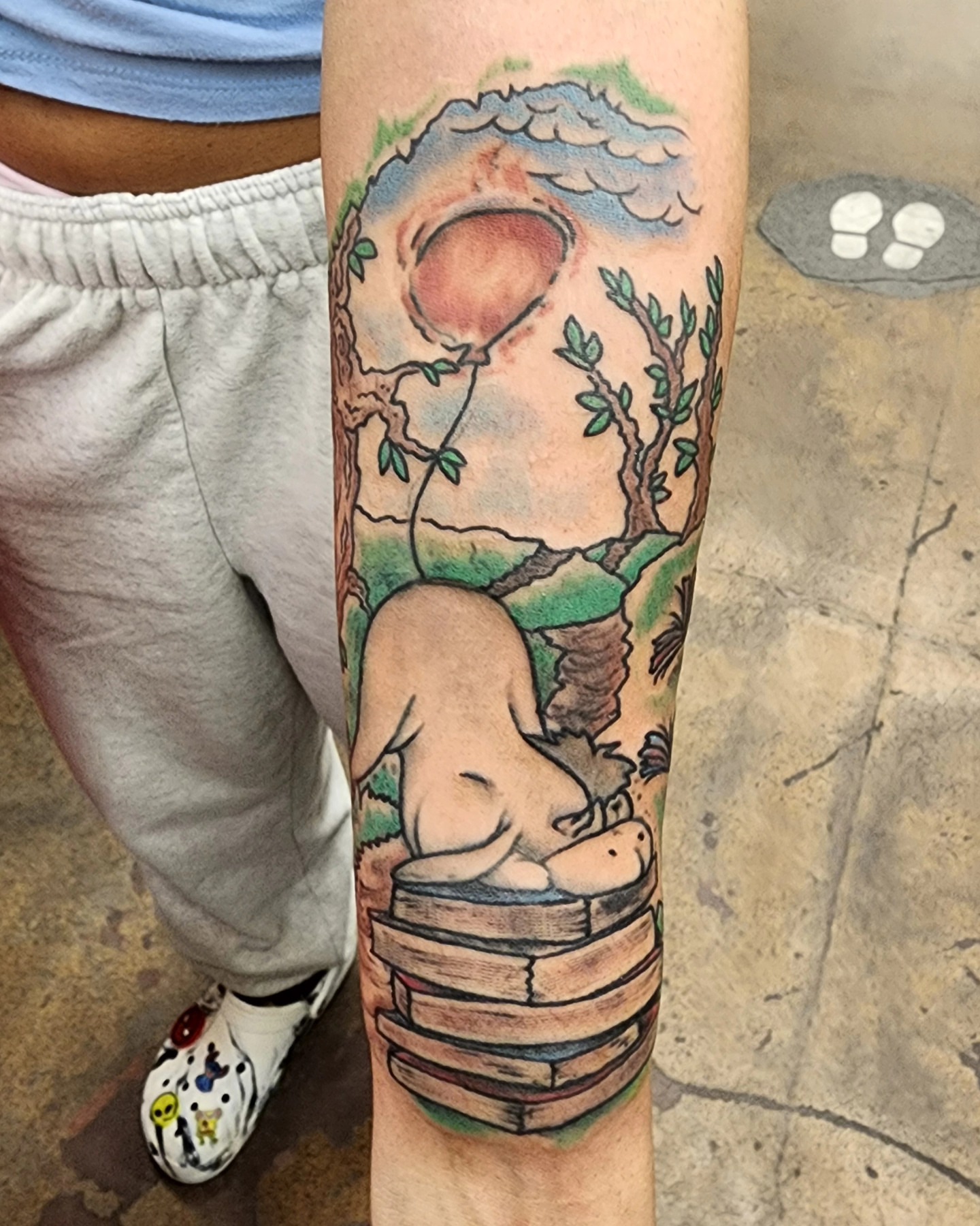 Pig in bucket realism tattoo on the forearm by @thedevilspaintbrush_