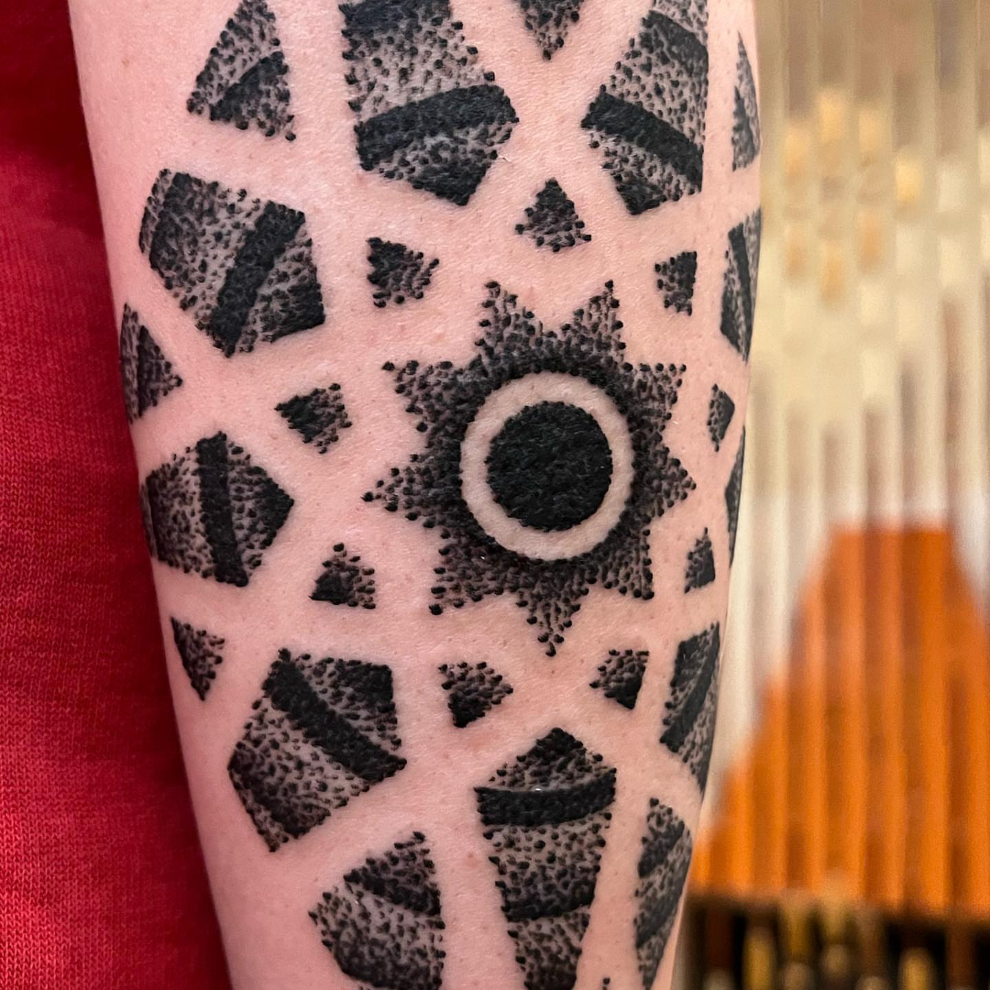 Geometric pattern dotwork tattoo on the forearm by kevvy