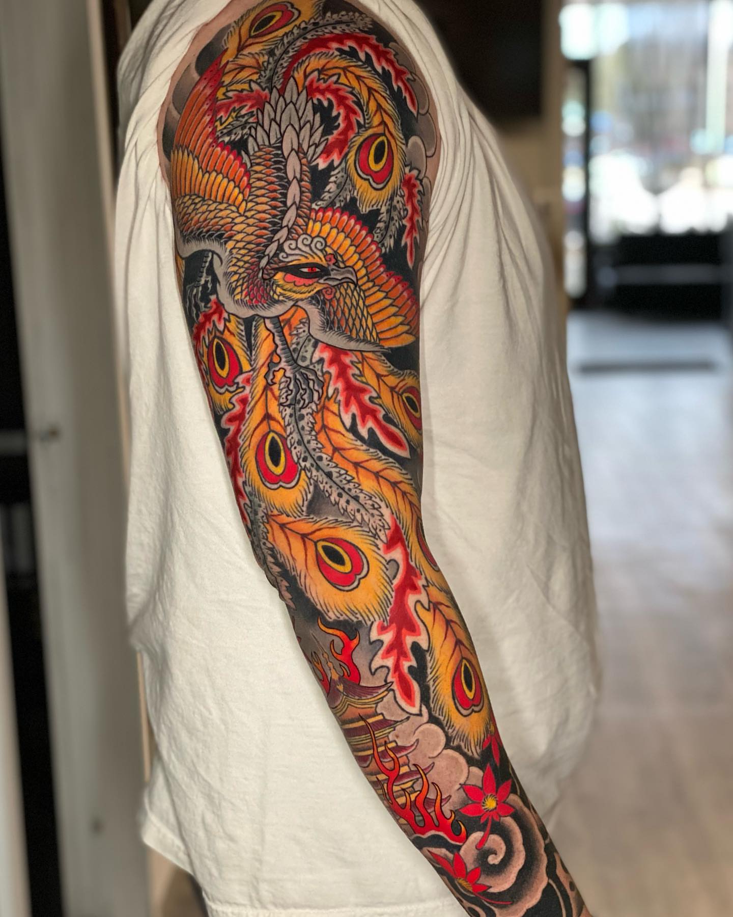 Peacock japanese irezumi tattoo on the forearm by Mitch Bonifay