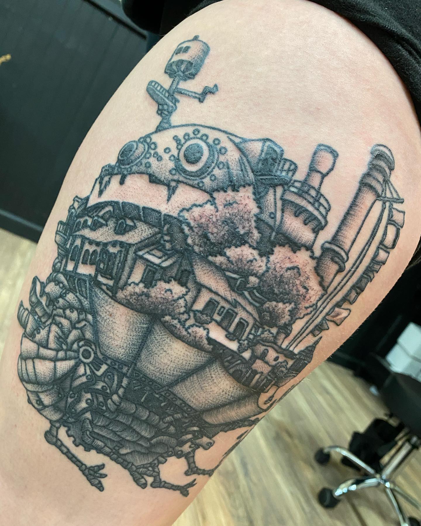 Mechanical cityscape dotwork tattoo on the thigh by Savanna Starr Mortensen
