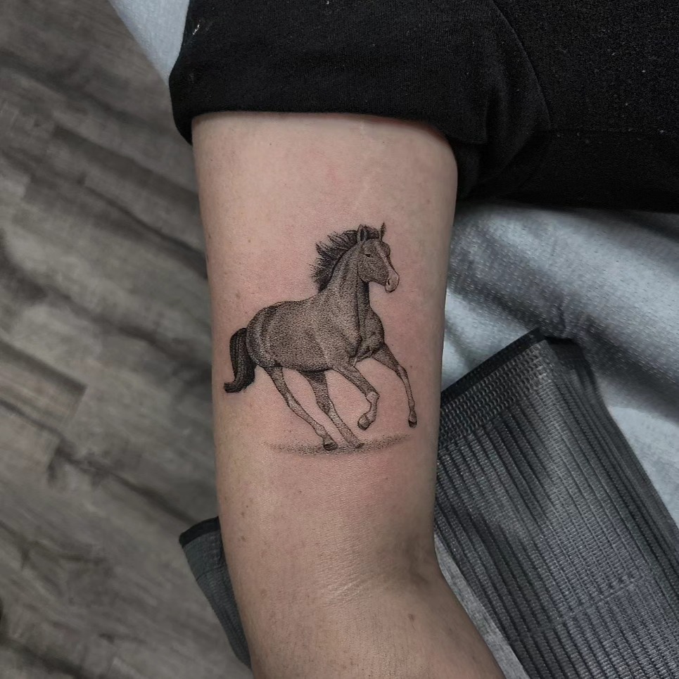 Horse realism tattoo on the forearm by Kyle Joseph [tattoo artist]