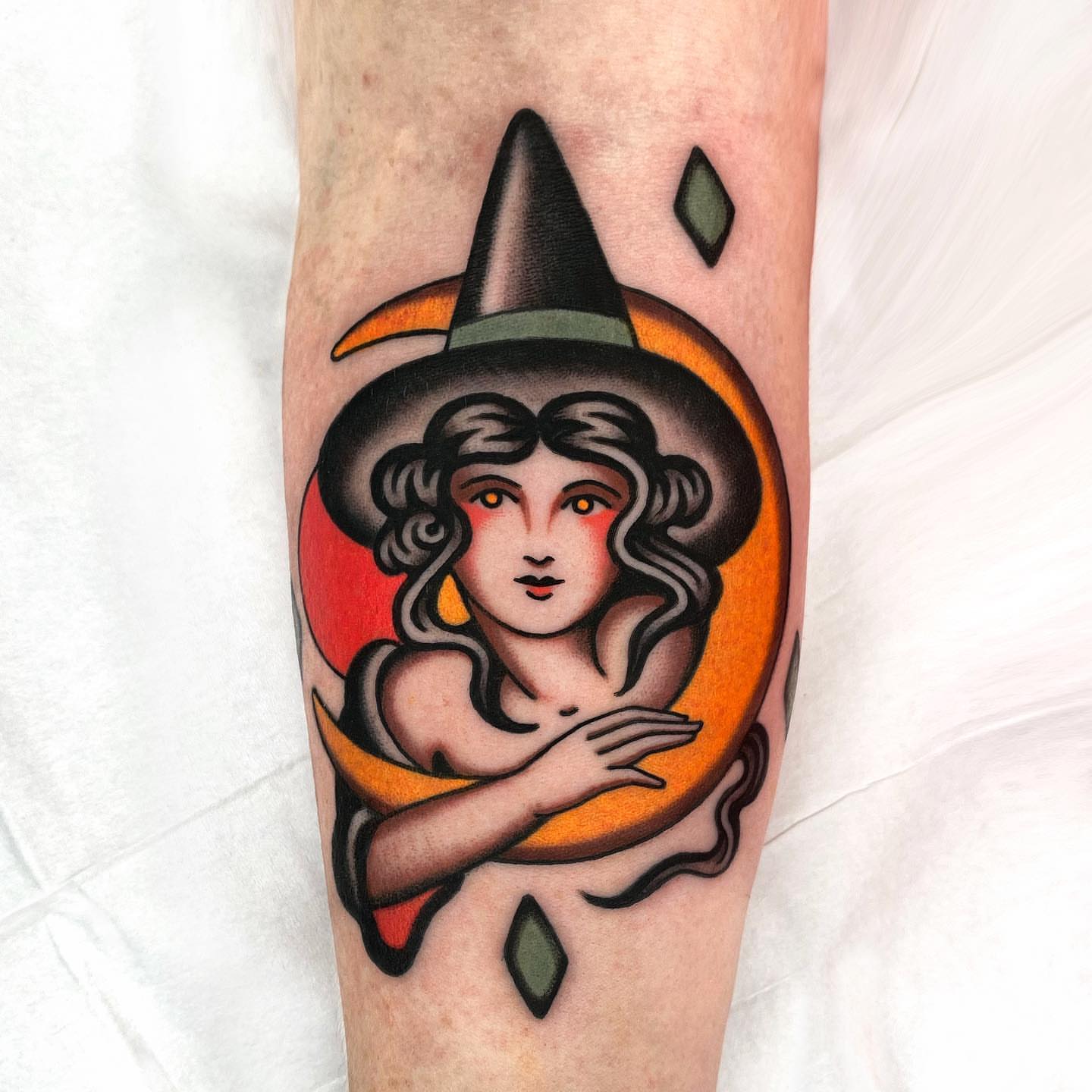 Witch American traditional tattoo on the forearm by Wes Hoffman