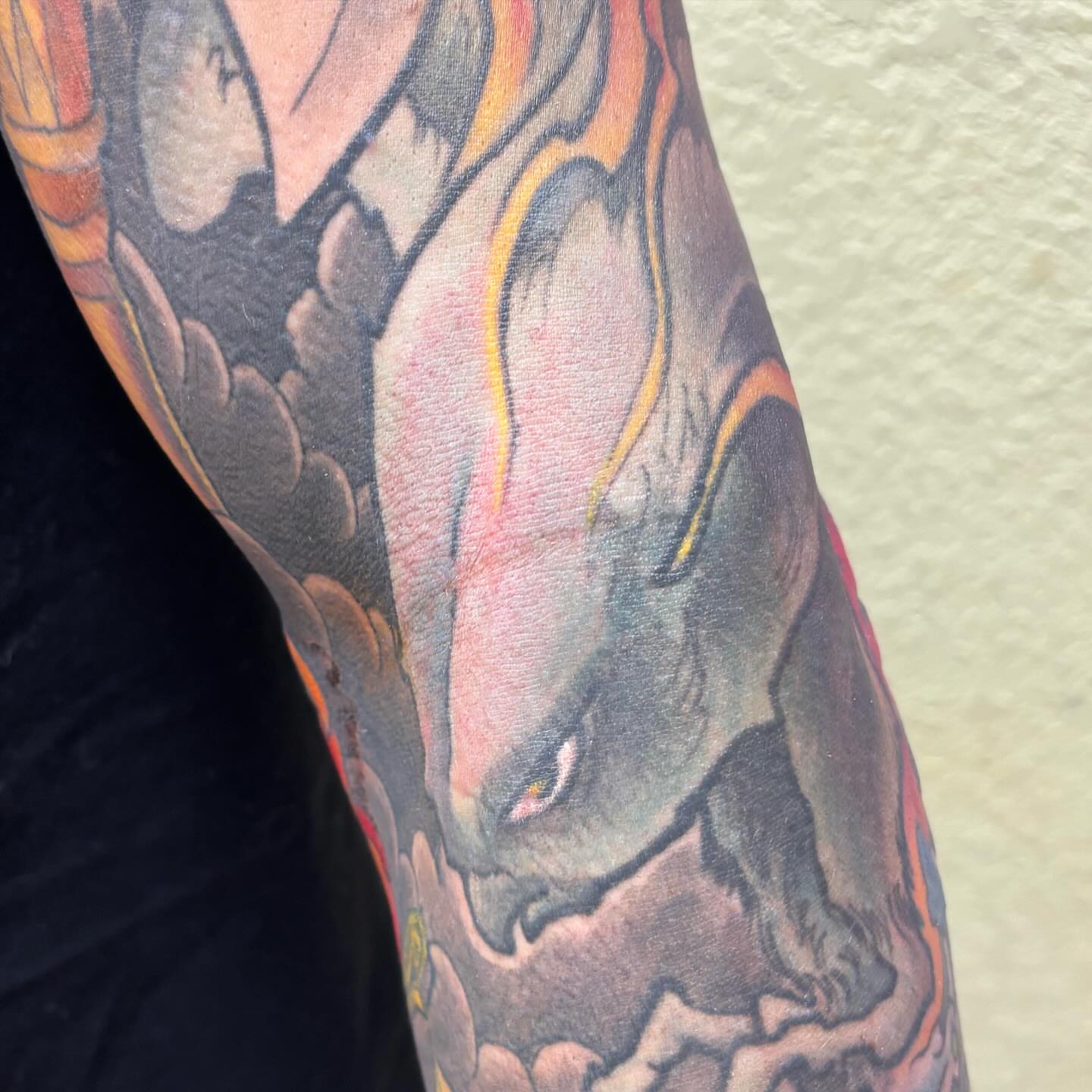 Dragon American traditional tattoo on the forearm by Rene Chavira