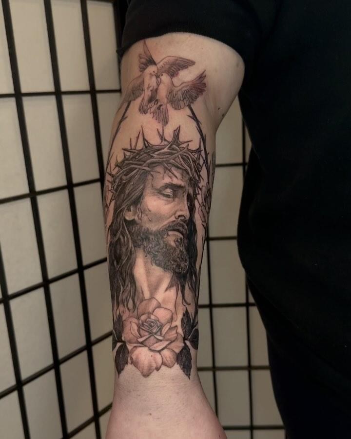 Religious figure with crown of thorns realism tattoo on the forearm by jordyn ๐ญ
