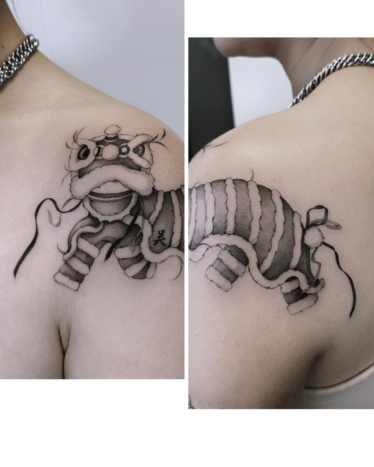 Lion dance black and grey tattoo on the shoulder by Angel