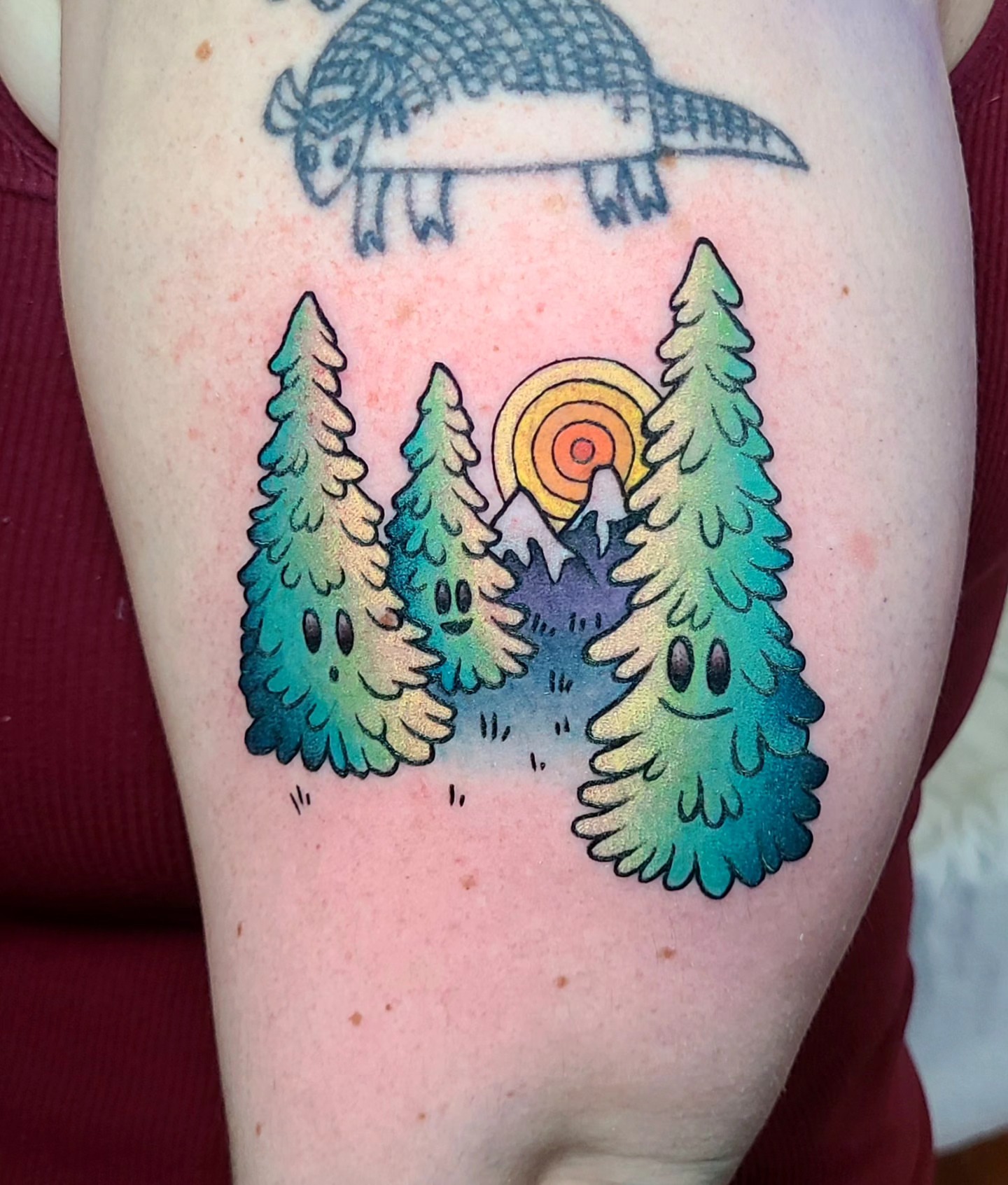 Pine trees and sunset dotwork tattoo on the forearm by Chloe🌿Tattoos