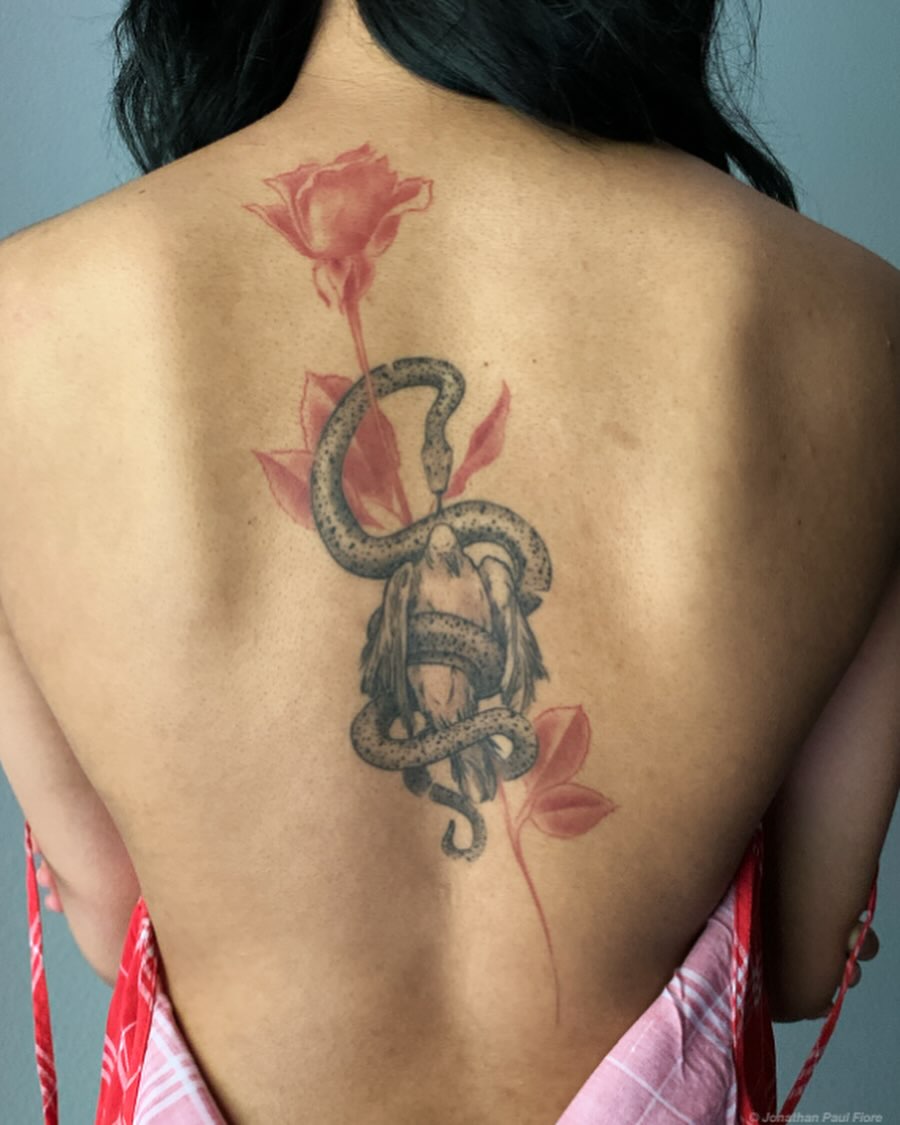 Snake and rose realism tattoo on the back by Jonathan Paul Fiore, Austin, Texas