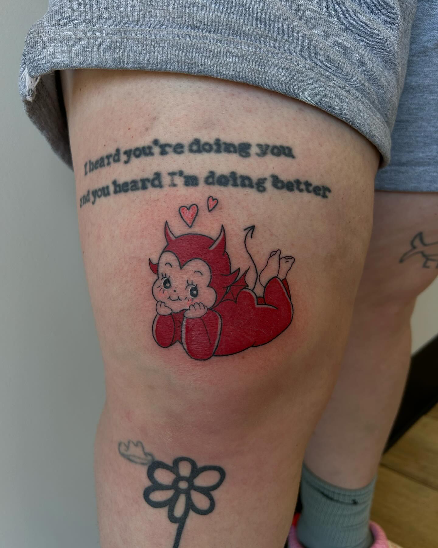 Baby devil illustrative tattoo on the thigh by 𝕯𝖆𝖓𝖎