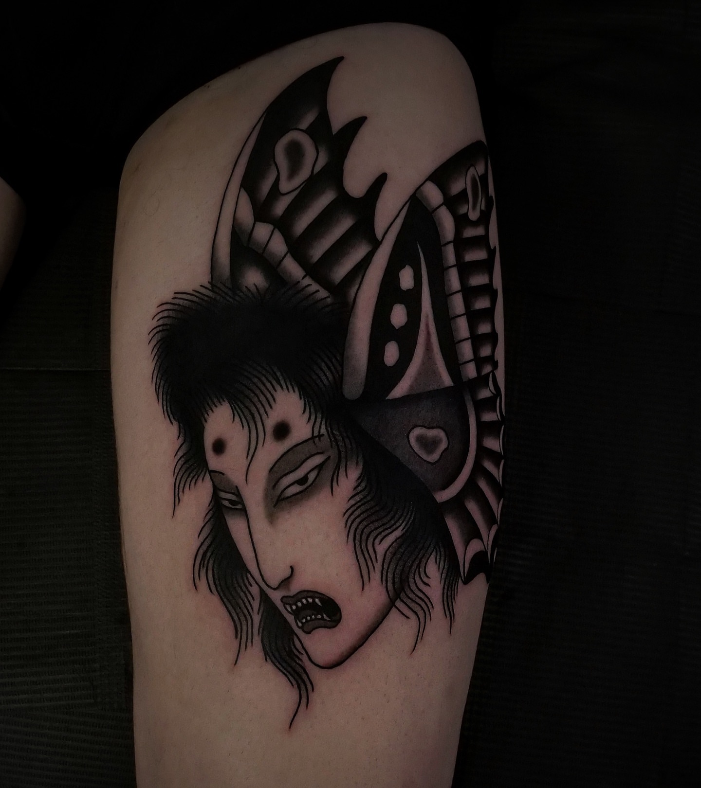Vampire dark realism tattoo on the forearm by Brandon Murphy