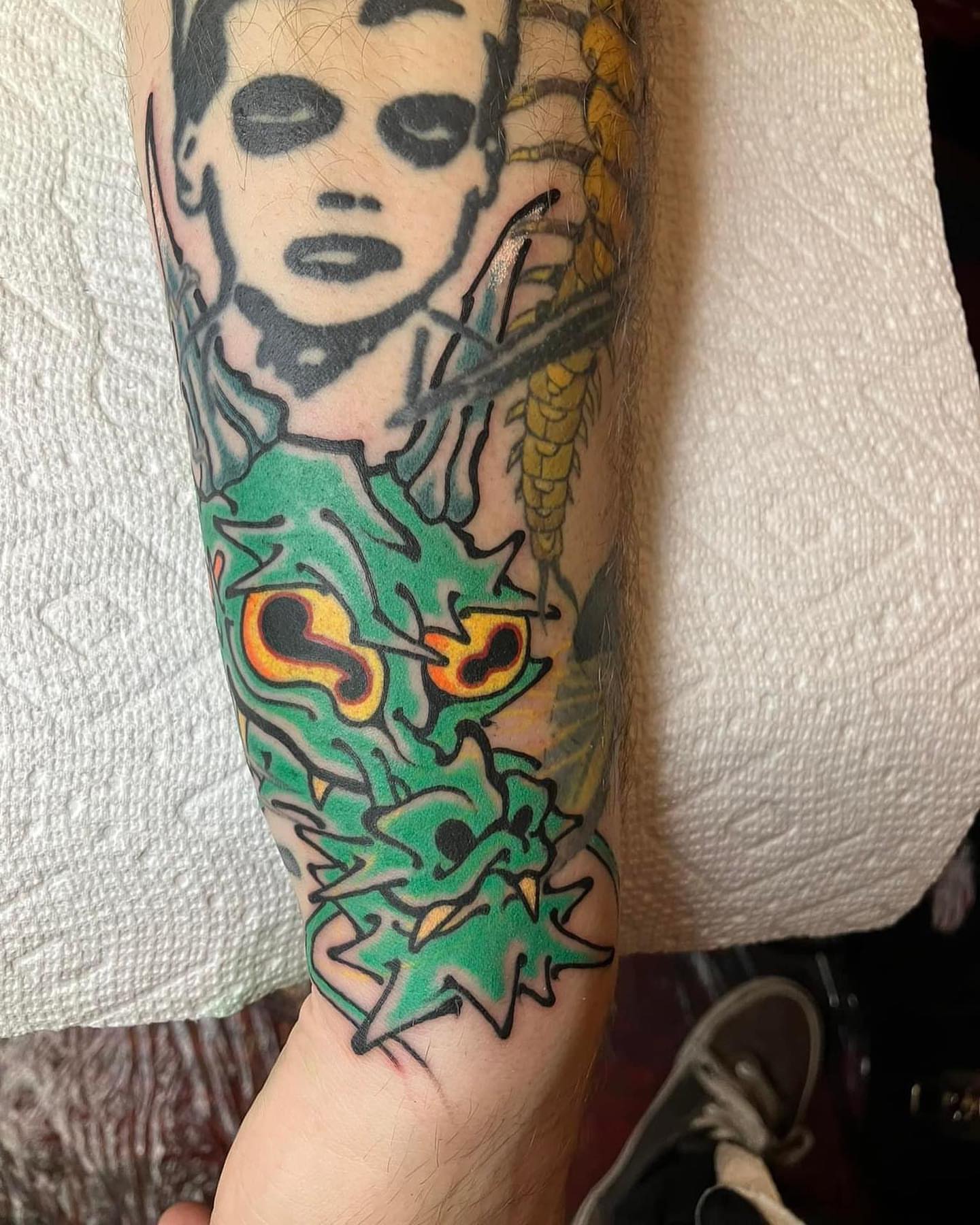 Portrait with dragon American traditional tattoo on the forearm by Adam Zgorliski_STStattoo