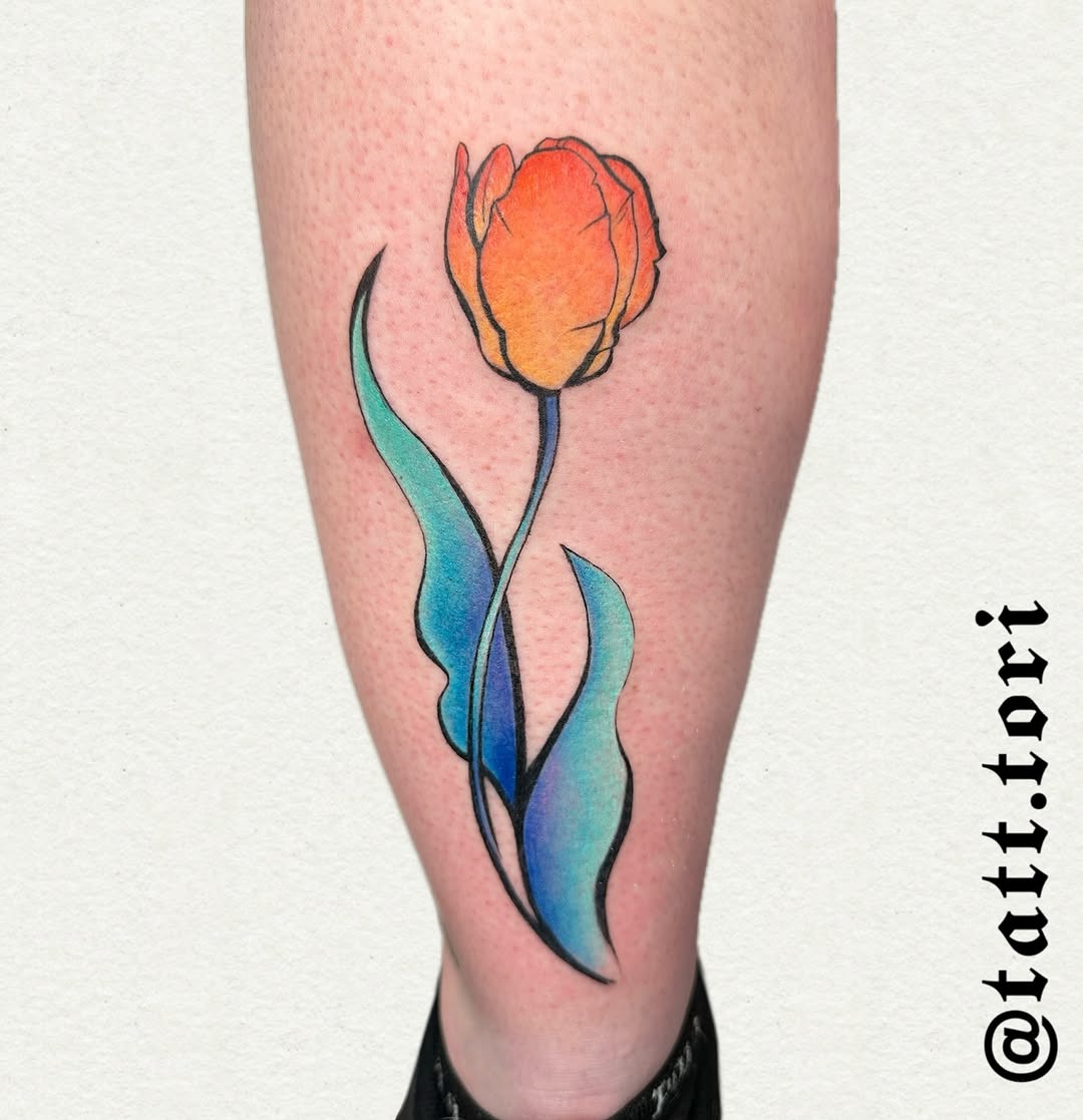 Orange tulip with blue leaves watercolor tattoo on the calf by 𝔱𝔬𝔯𝔦