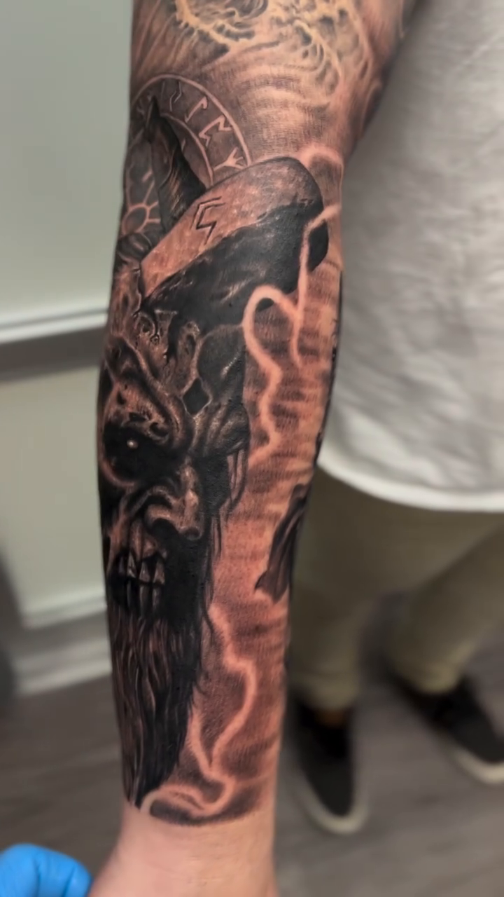 Viking warrior and skull realism tattoo by Krys King Tattoos