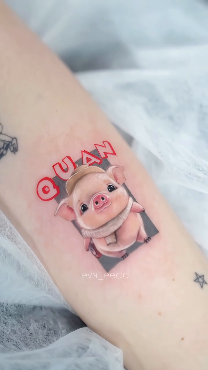 Piglet with text realism tattoo by Eva Liu