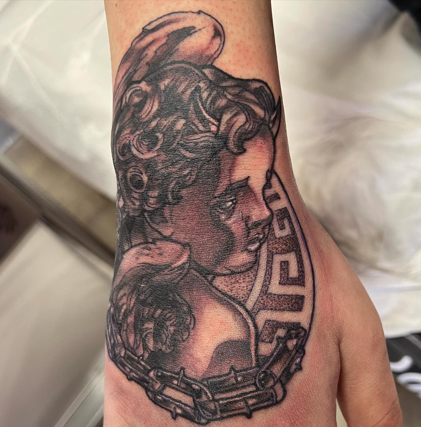 Tattoo by @fabianbaigueratattoo — black_and_grey, realism