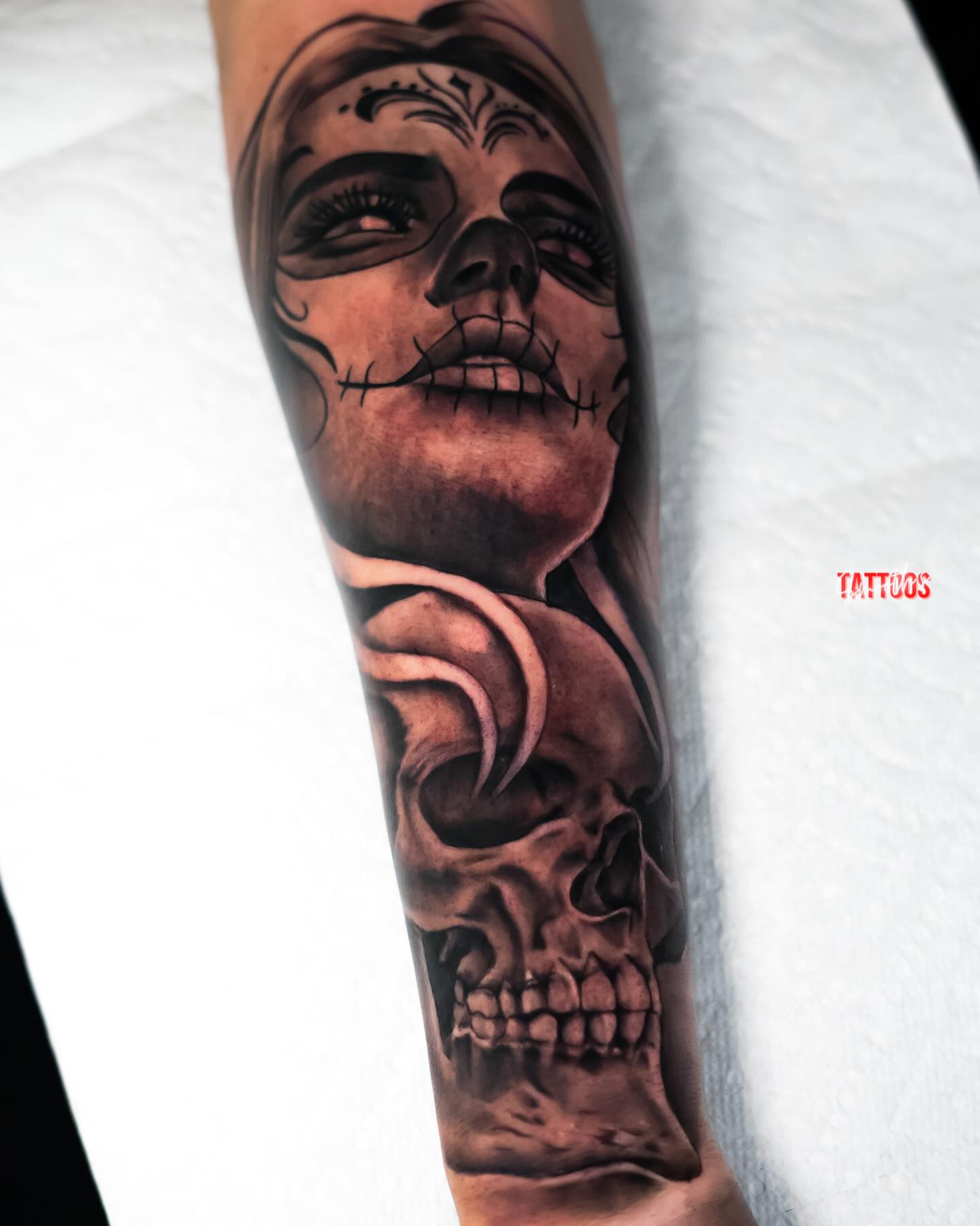 Sugar skull realism tattoo on the forearm by Josh Acosta