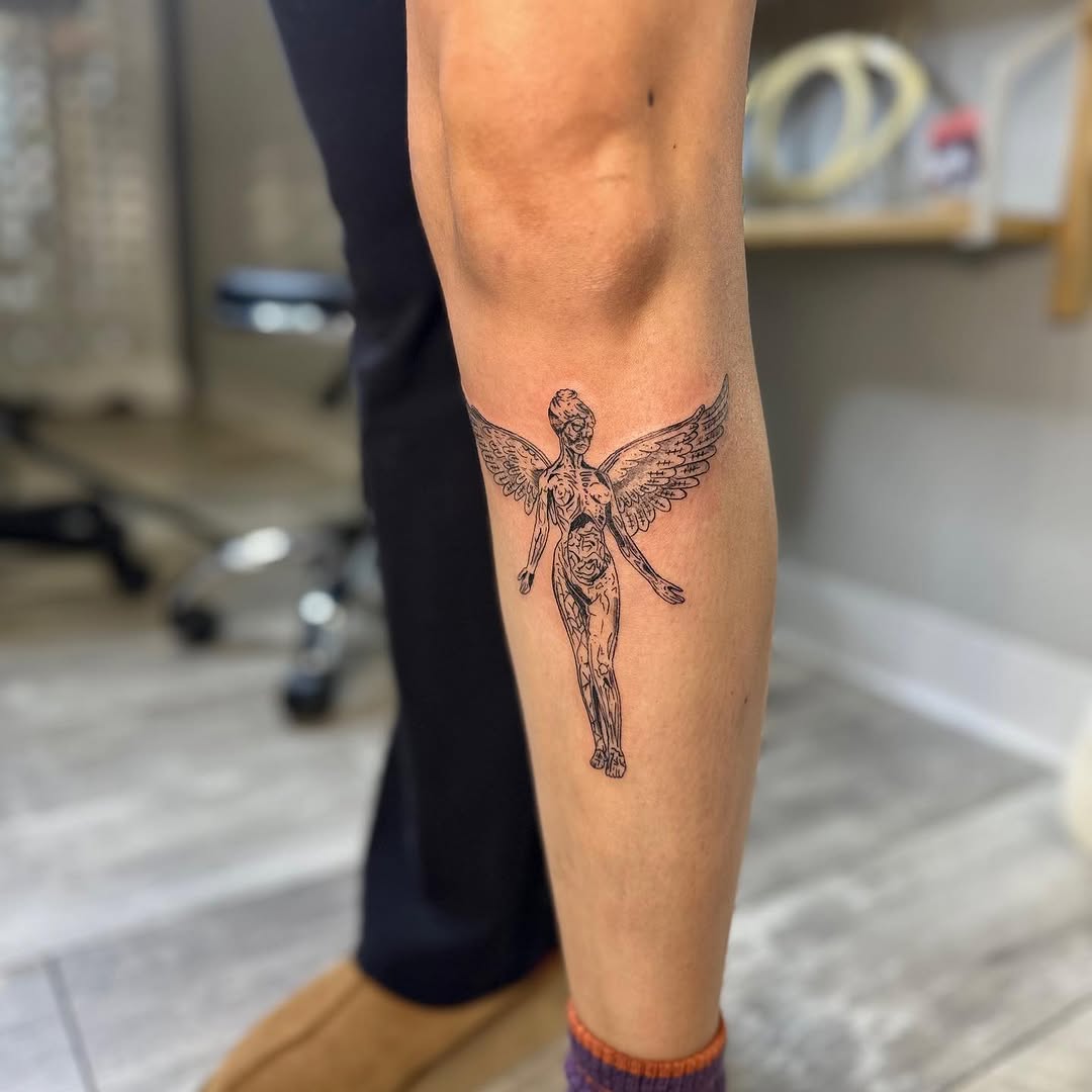 Winged figure realism tattoo on the forearm by brinley - fine line tattoos, Crescent Springs, Kentucky