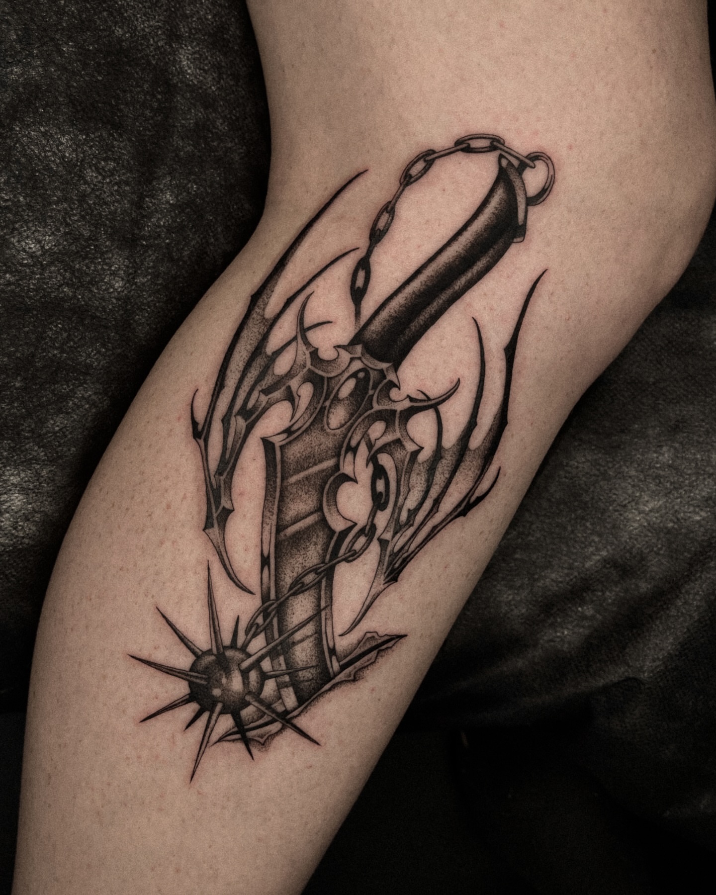 Sword and chain geometric tattoo on the forearm by David Ha