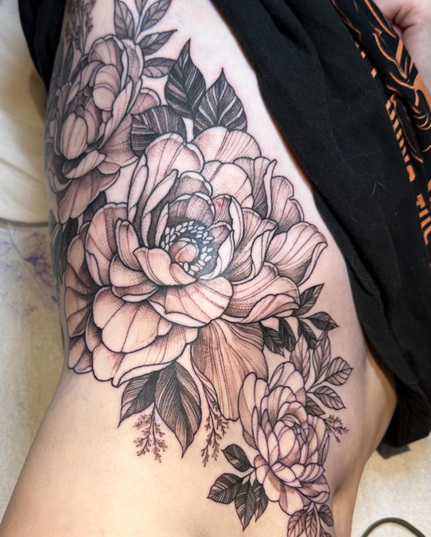 Peonies and leaves dotwork tattoo on the thigh by 🦎Langley Osborn Tattoos🦎, Maryville, Tennessee
