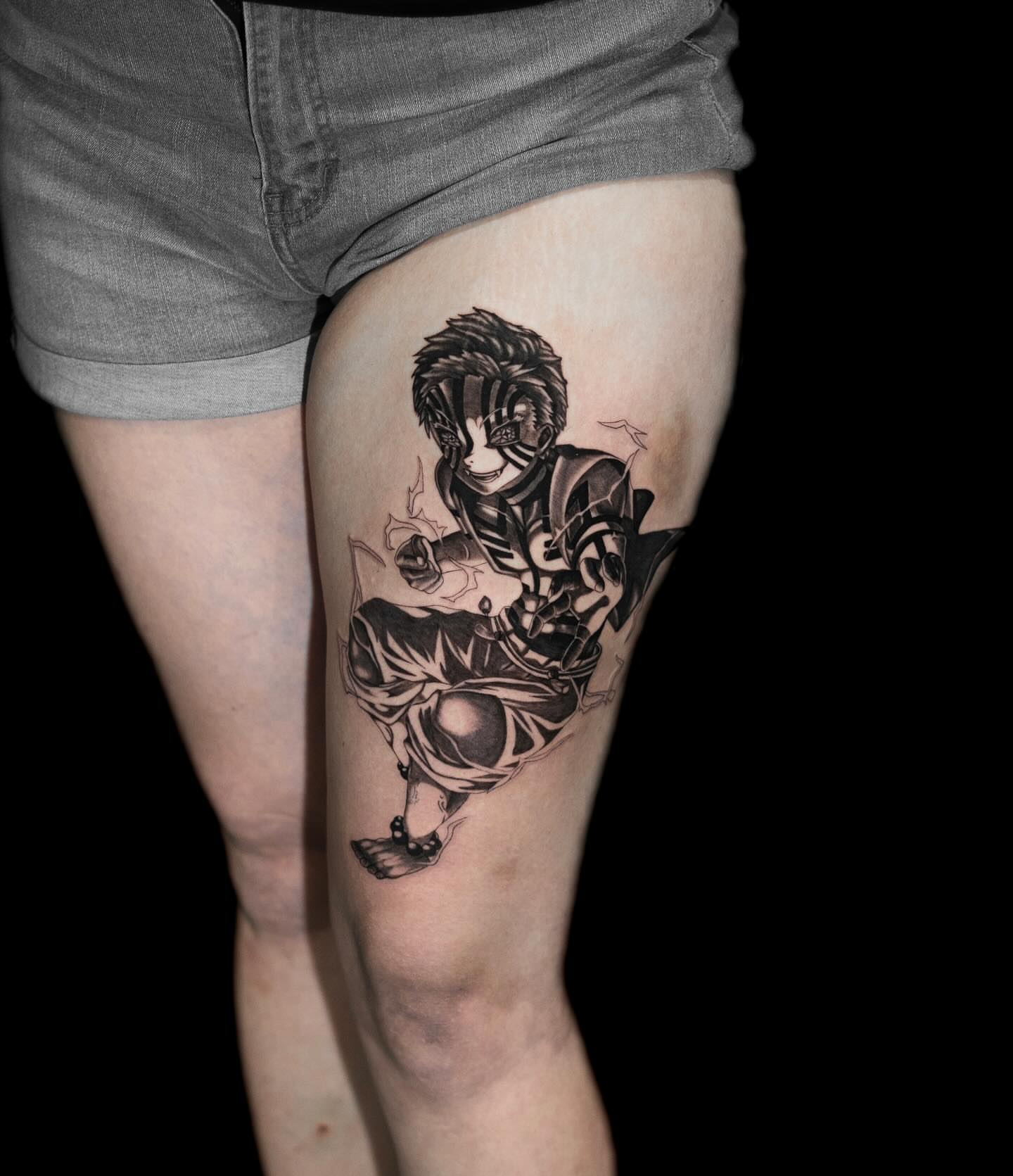 Anime character anime tattoo on the thigh by Tattoo Artist
