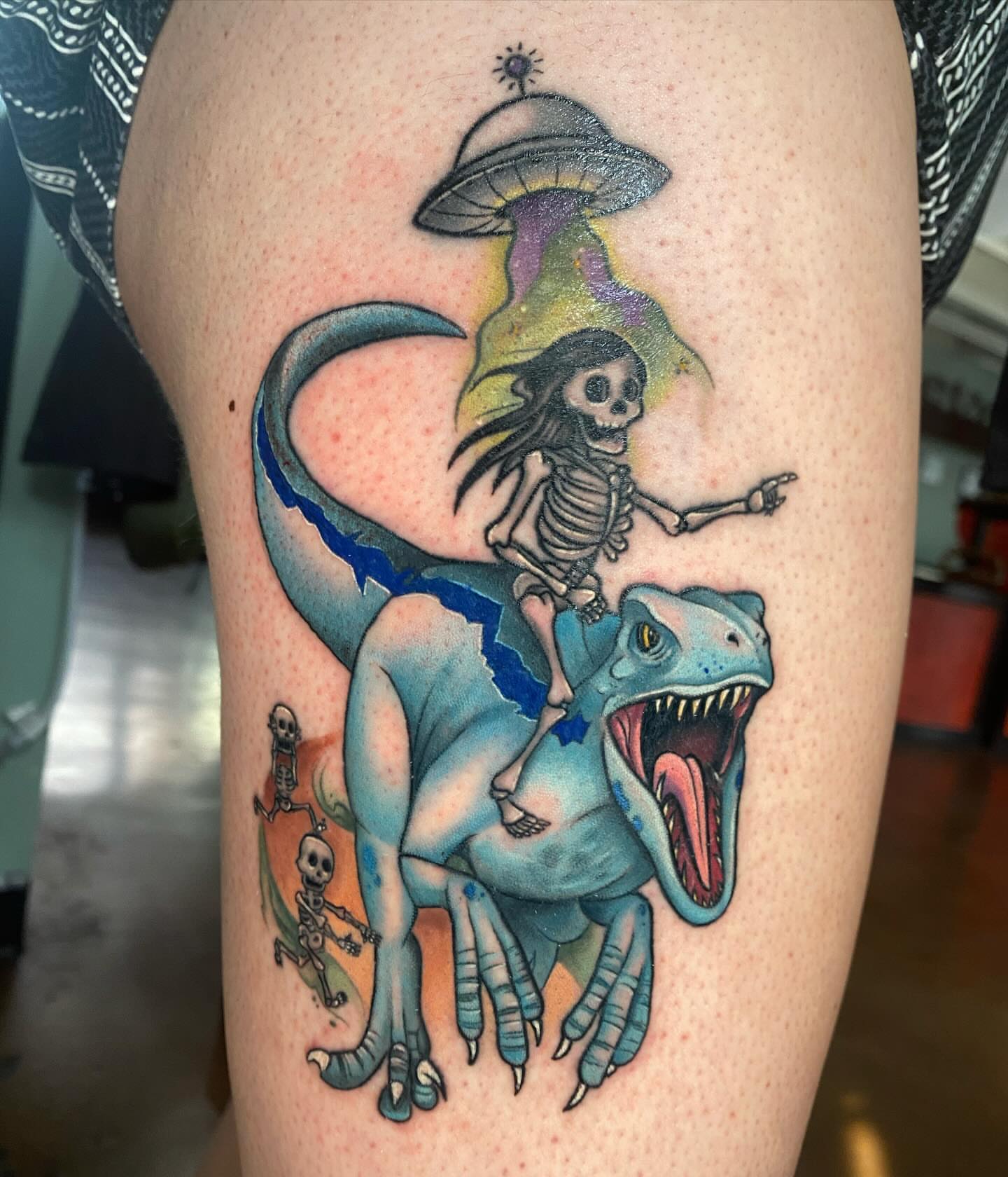 Dinosaur skeleton dotwork tattoo on the thigh by Chelsey Moore, Albuquerque, New Mexico