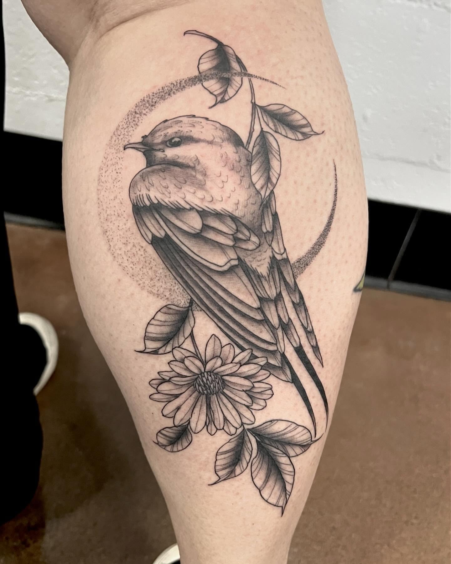 Bird and flower dotwork tattoo on the thigh by Drew Foster, Toledo, Ohio