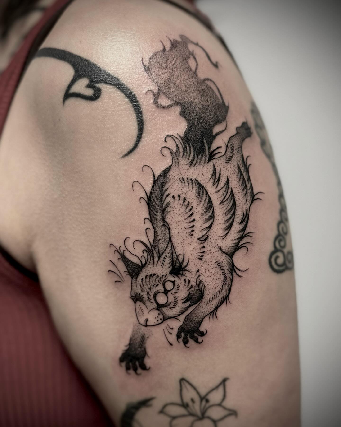 Demon dotwork tattoo on the shoulder by Melanie