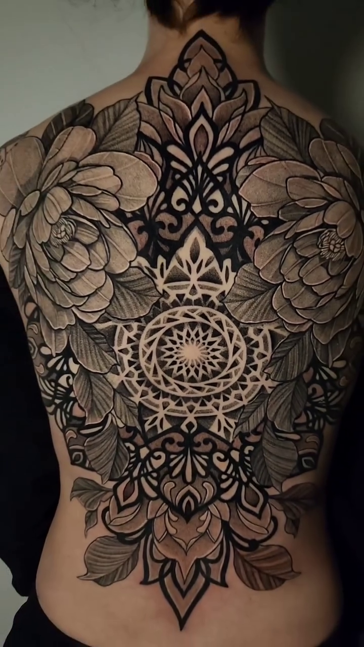 Mandala with floral elements geometric tattoo by Kyle Joseph [tattoo artist]