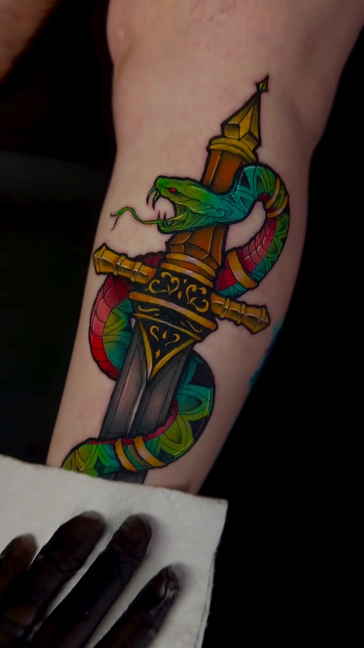 Snake and dagger American traditional tattoo by 𝖟𝖊𝖓𝖋𝖚𝖑𝖑