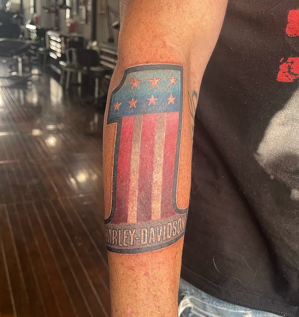 American flag American traditional tattoo on the forearm by Paul Hicks