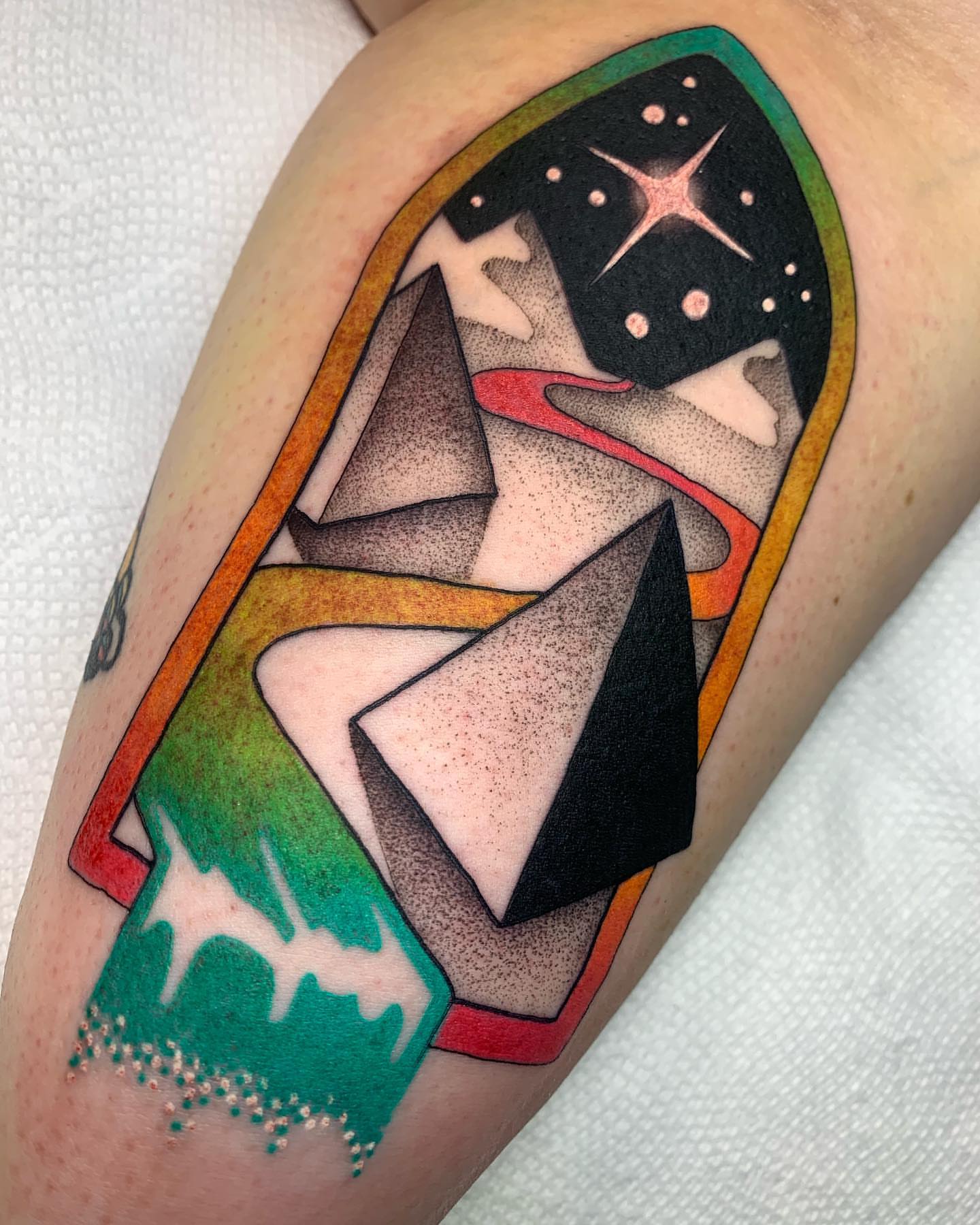 Geometric abstract dotwork tattoo on the thigh by Carly Zehring