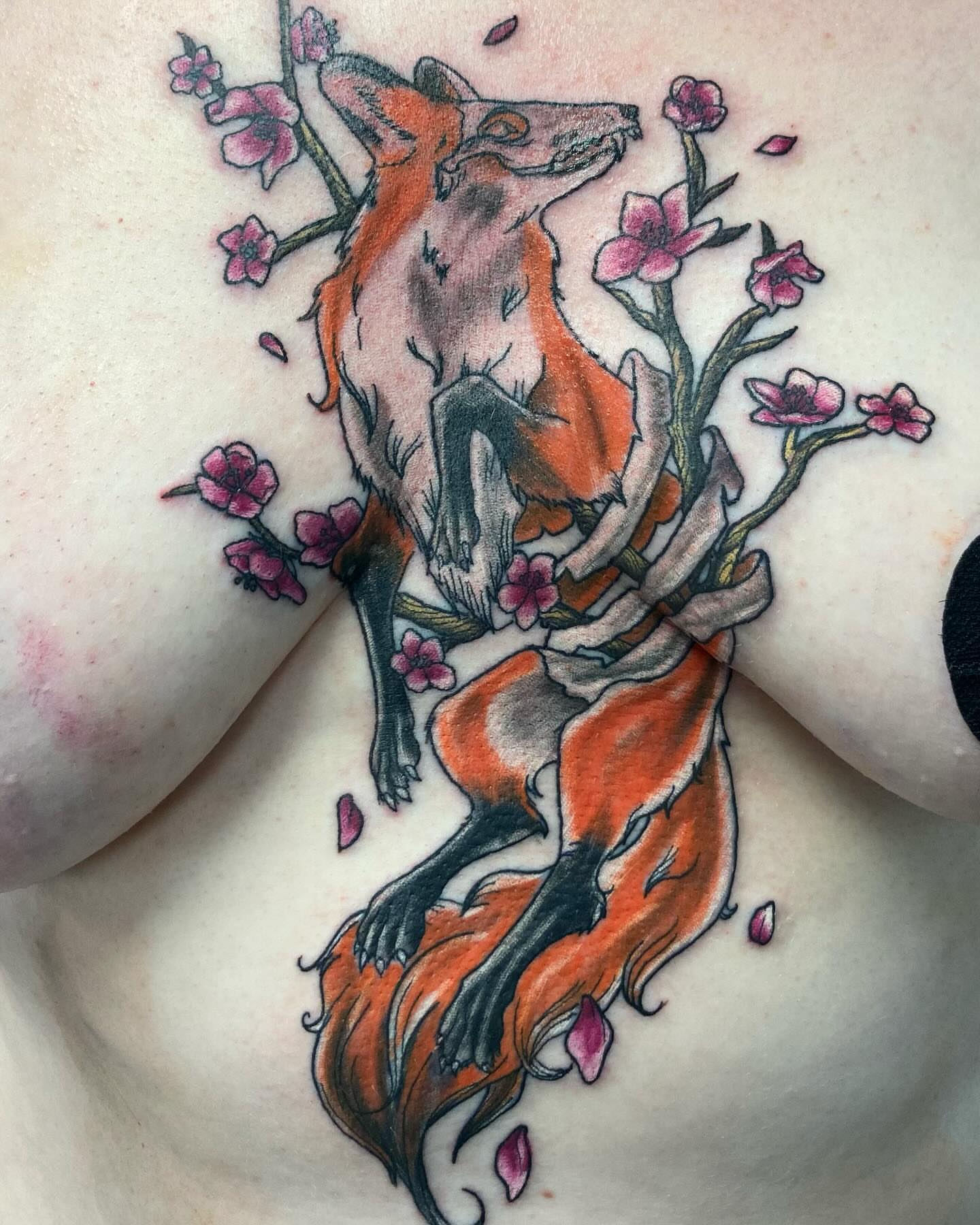 Fox and blossoms new school tattoo on the chest by Madeline, Akron, Ohio