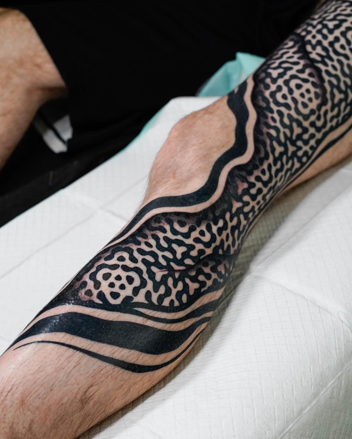 Geometric pattern geometric tattoo on the forearm by Ross Krandel